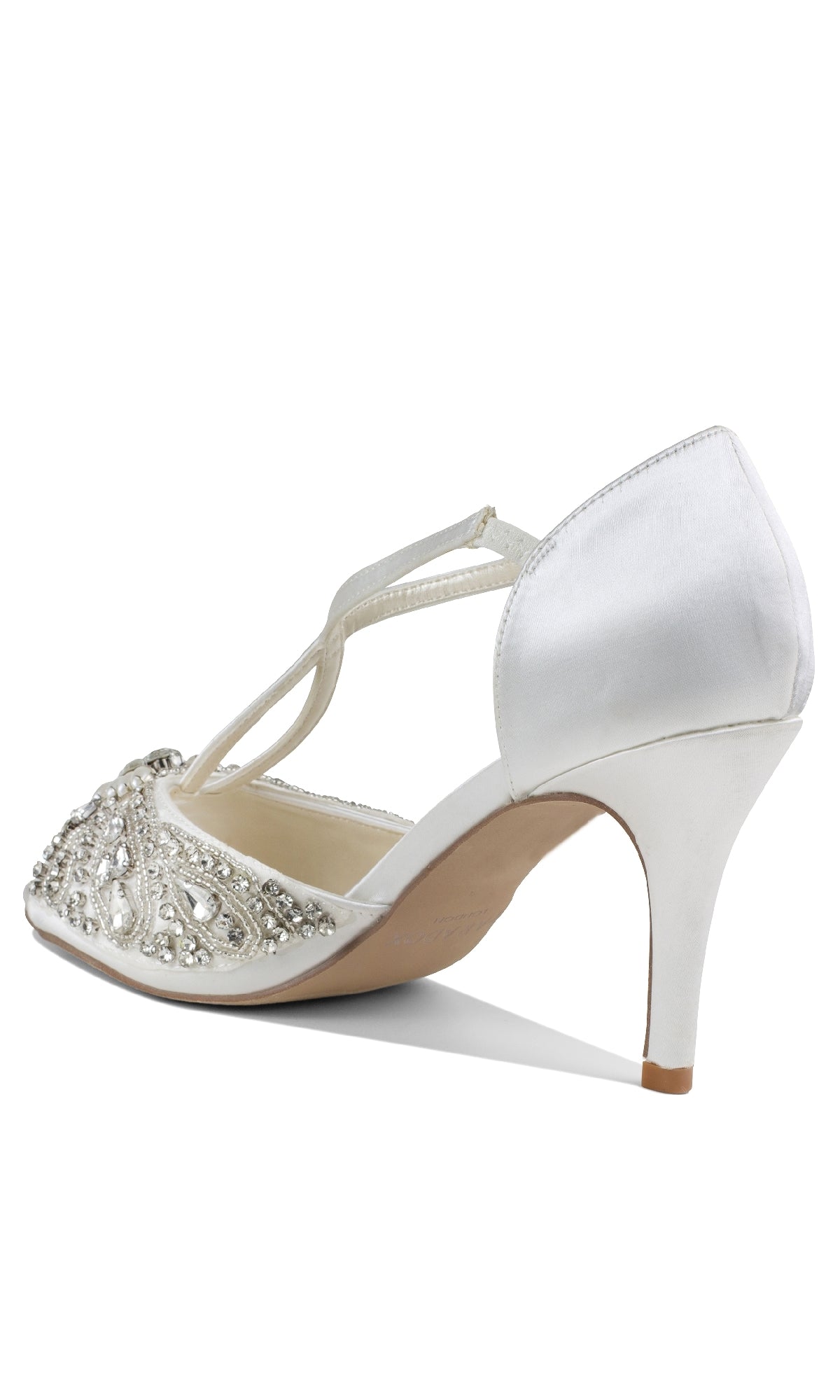 The Elin Ivory Satin Prom Shoes (Paradox London P2204) feature a stiletto heel, T-strap, and beaded rhinestone toe—elegant jeweled formal footwear in white ivory satin, shown from the rear side. Perfect for any special occasion.